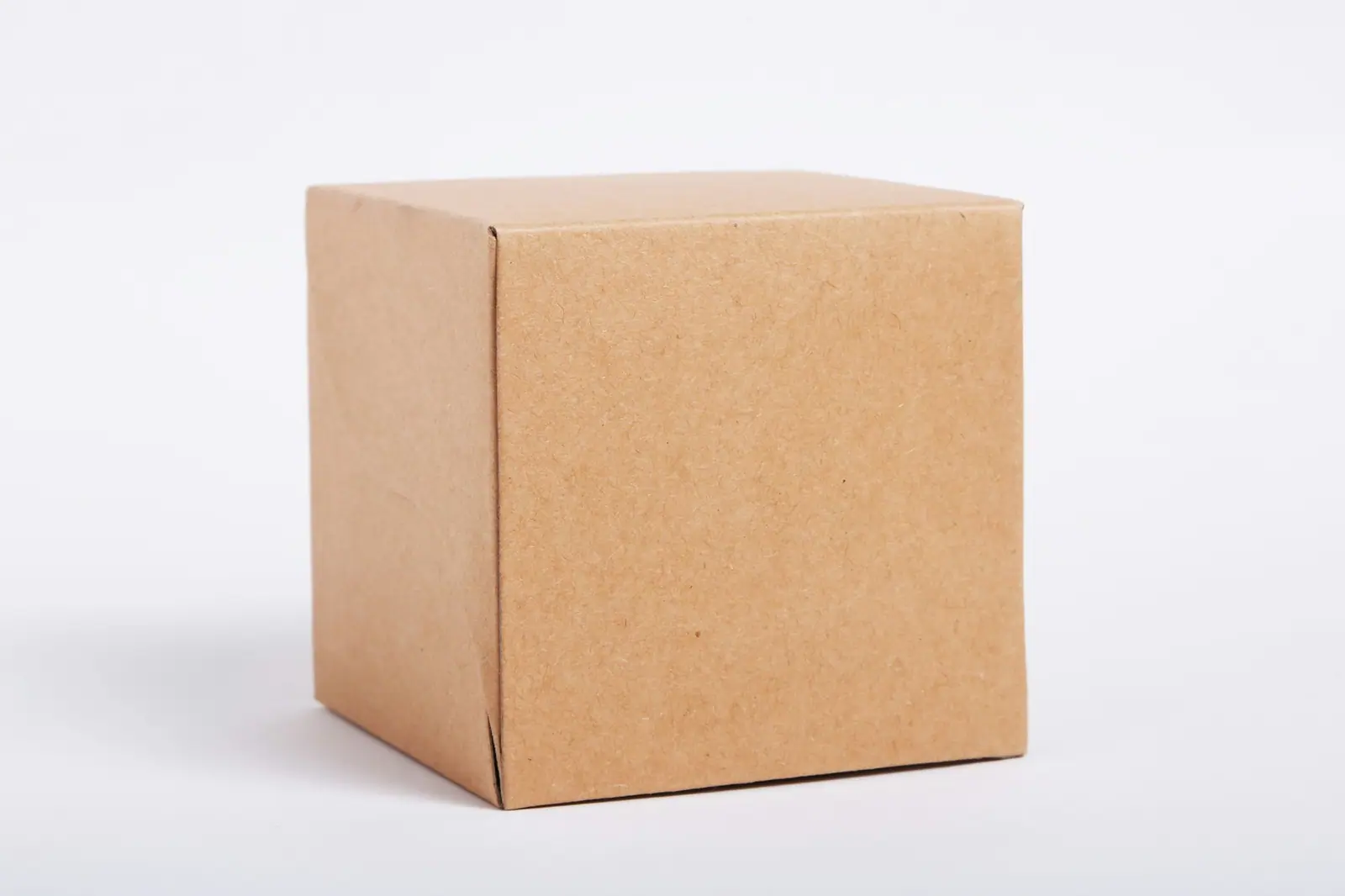 Rows of packaged goods in plain cartons, representing general wholesale product categories.